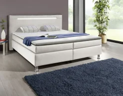 Möbel></noscript>Boxspringbett mit LED-Beleuchtung