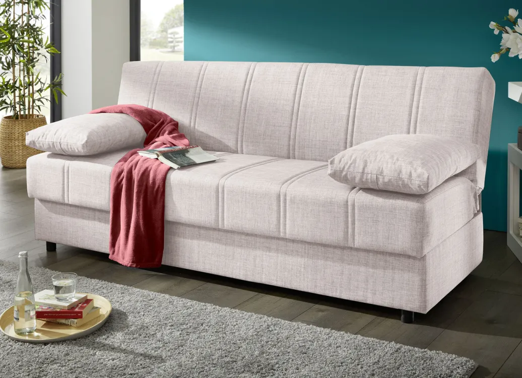 Möbel>Frei im Raum aufstellbares Schlafsofa mit Dekokissen und Bettkasten