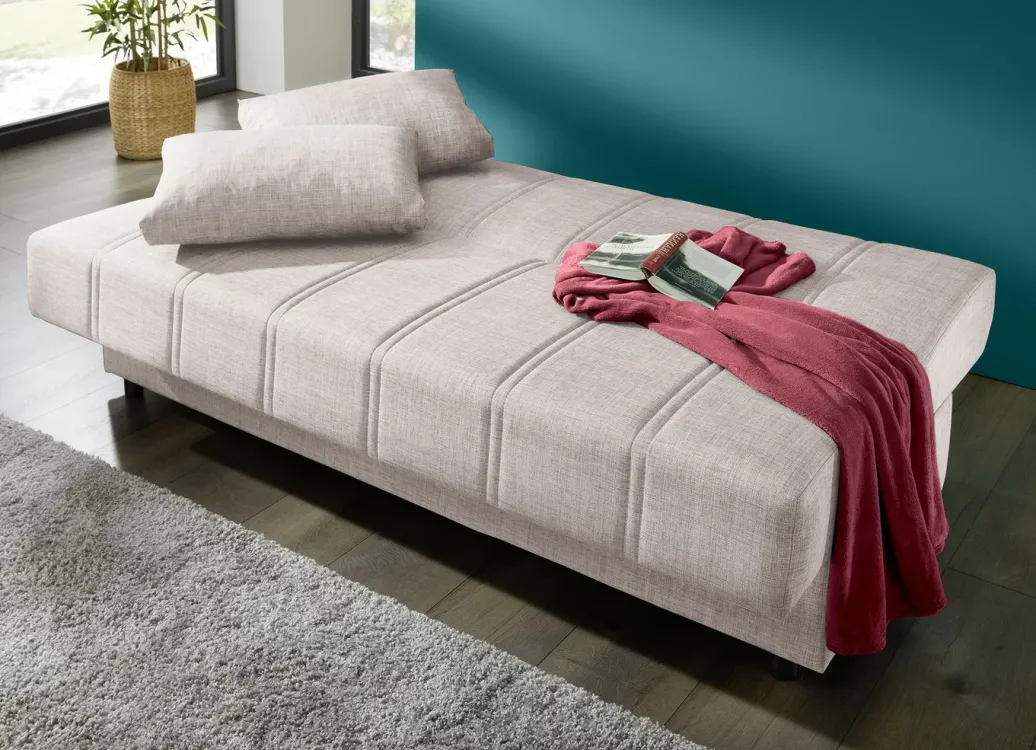 Möbel>Frei im Raum aufstellbares Schlafsofa mit Dekokissen und Bettkasten