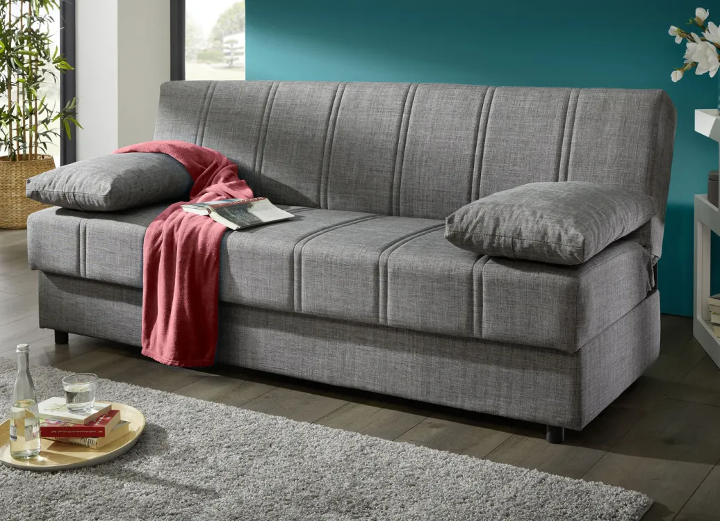 Möbel>Frei im Raum aufstellbares Schlafsofa mit Dekokissen und Bettkasten