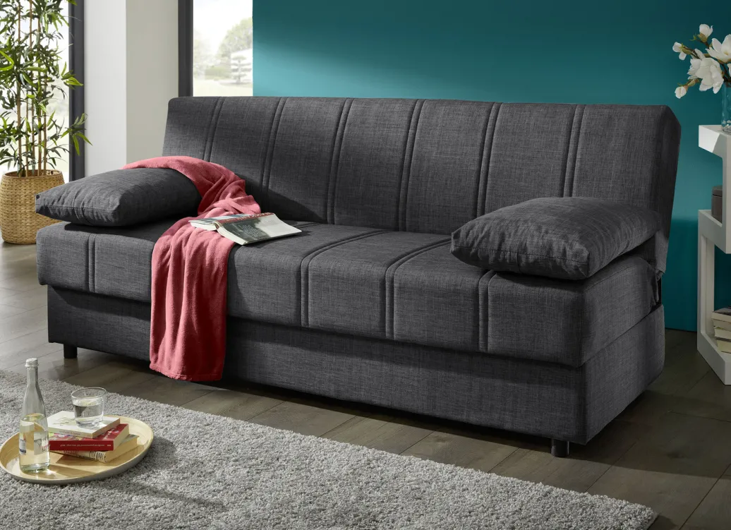 Möbel>Frei im Raum aufstellbares Schlafsofa mit Dekokissen und Bettkasten