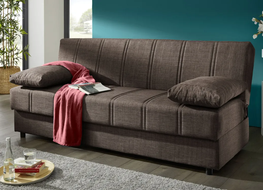 Möbel>Frei im Raum aufstellbares Schlafsofa mit Dekokissen und Bettkasten