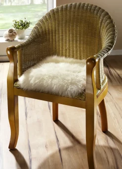 Heimtextilien></noscript>Merino-Lammfell-Sitzauflage in Tierform