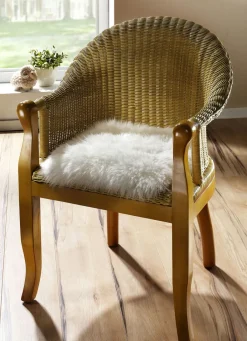 Heimtextilien></noscript>Merino-Lammfell-Sitzauflage in Tierform