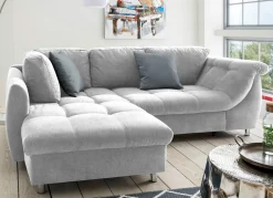 Möbel></noscript>Polsterecke mit Dekokissen