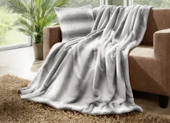 Heimtextilien>Wohndecke und Kissenbezug aus Kaninchenfell-Imitat